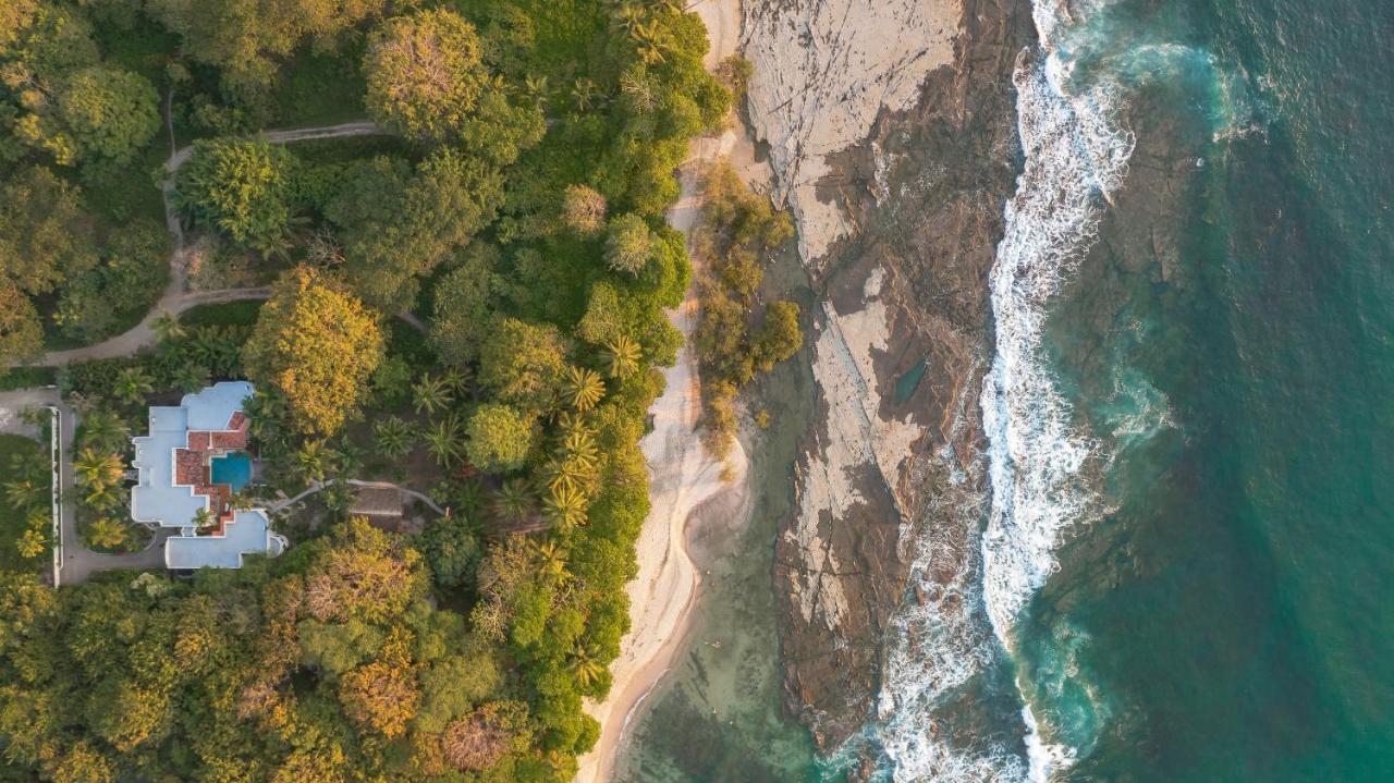 Paradise Beach Lodge マルパイス エクステリア 写真